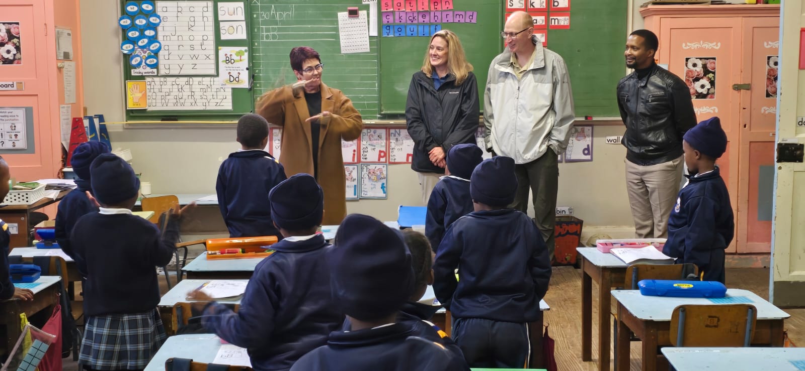 SCI chapter members visiting a school classroom