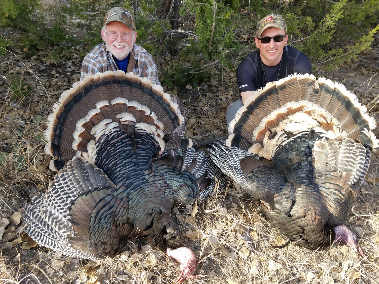 Chapter members with wild turkeys after a successful hunt